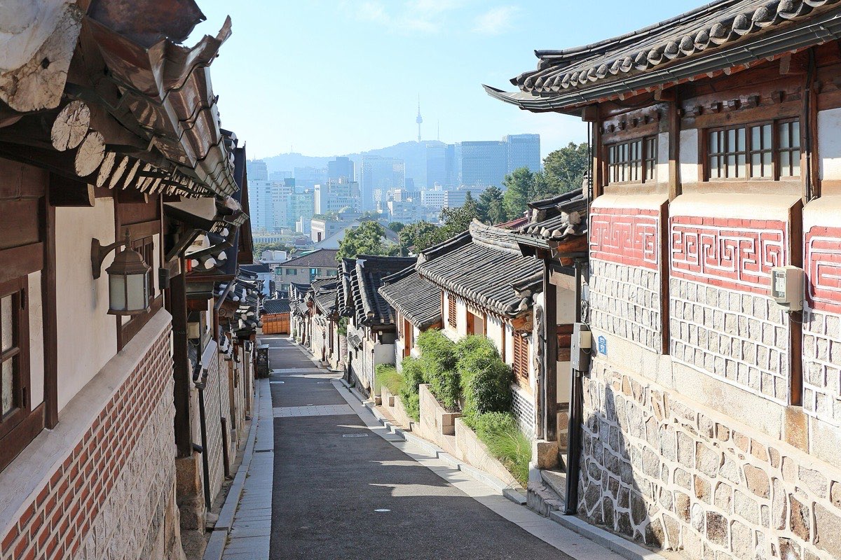 Hanok rooftops in Bukchon with N Seoul Tower in the distance