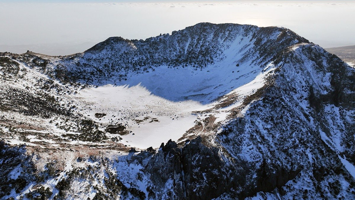 Snow-covered Baengnokdam crater at the summit of Hallasan