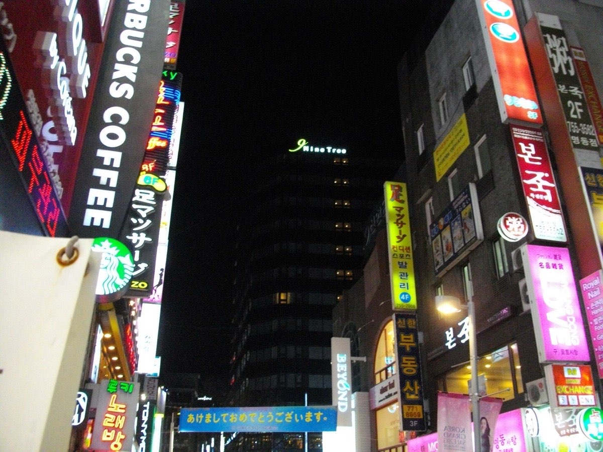Myeongdong shopping street at night with neon signs